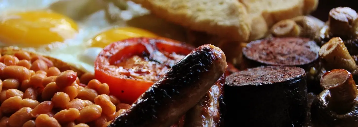 Full Irish breakfast with eggs, sausage, bacon and soda bread